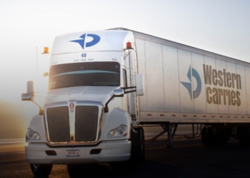 Western Carriers logistics truck inside industrial plant