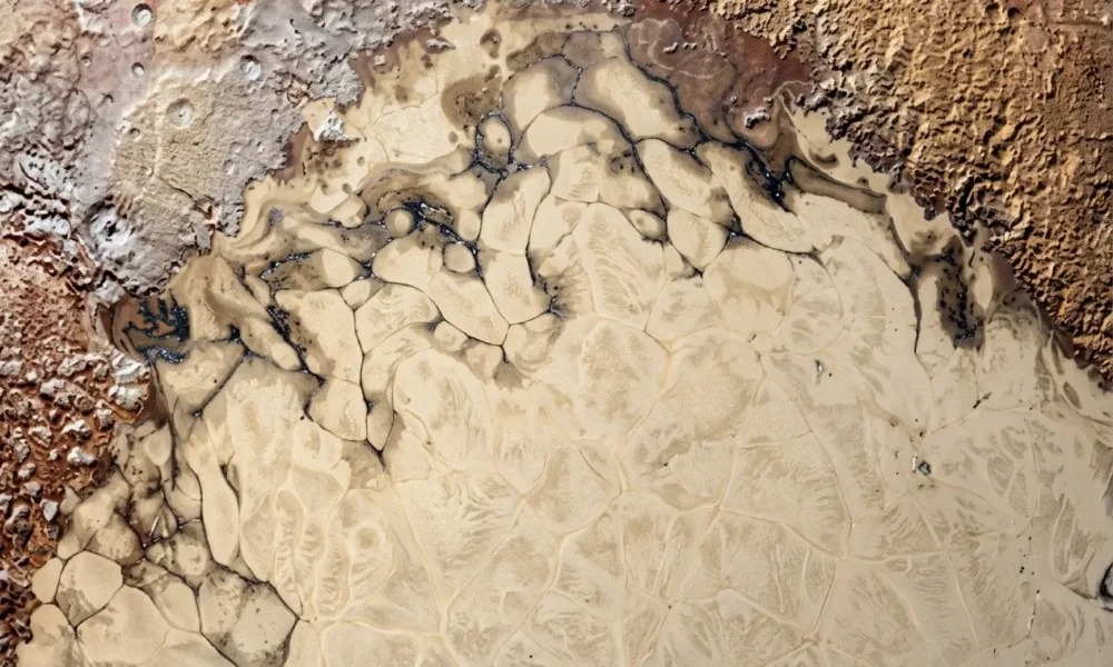 Pluto Sputnik Planitia liquid nitrogen glacier dark streaks
