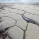 Pluto Sputnik Planitia liquid nitrogen seepage stains